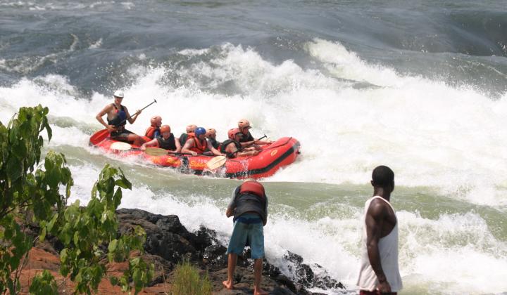 People rafting the  Bujagali rapids on the River Nile (Jinja Uganda)