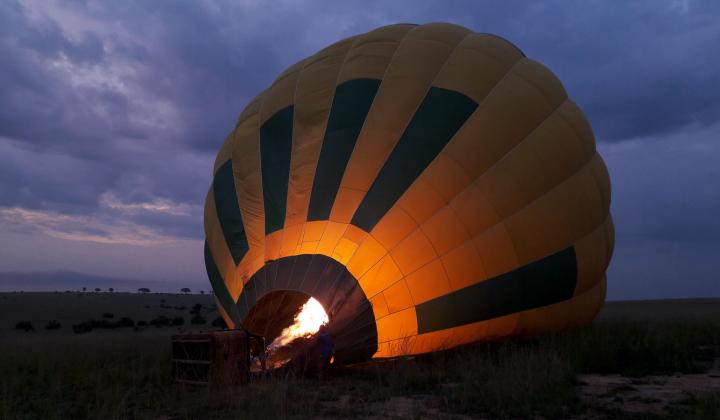 Inflating the hot-air balloon before sunrise (Murchison Falls, Uganda)